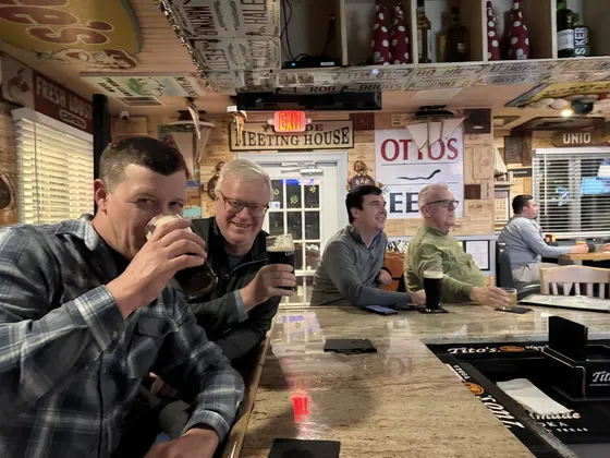 Guests enjoying a drink at the bar