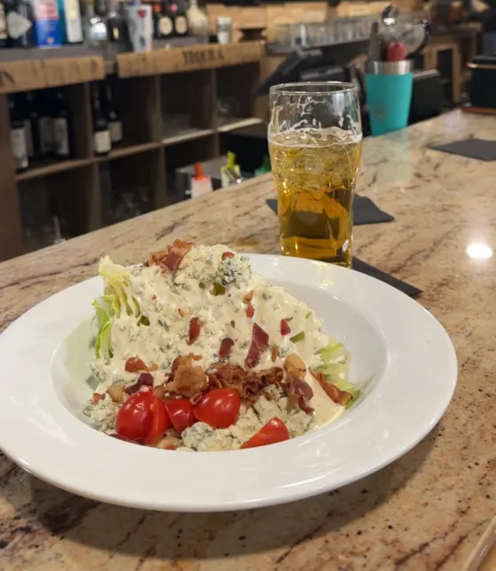 The Wedge salad with bacon and blue cheese