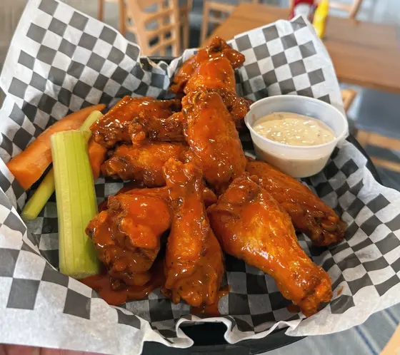 Buffalo-style wings in a checkered basket